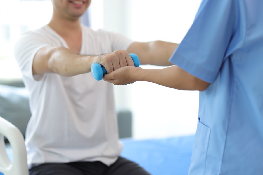 nurse in hospital is doing physiotherapy for a mal 2026 01 11 11 09 37 utc